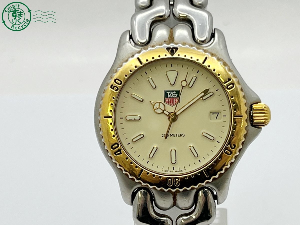 AL0708018　△ 1円～！ TAG HEUER タグホイヤー セルシリーズ S95.713C クォーツ アイボリー文字盤 コンビカラー デイト 腕時計 現状品