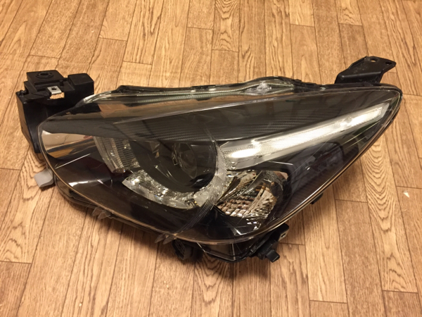 マツダデミオ(DJ)左ヘッドライトユニット中古LED