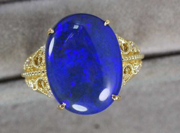 ￥100～ソ付18金　大粒6.838天然ブラックオパールD0.08リング