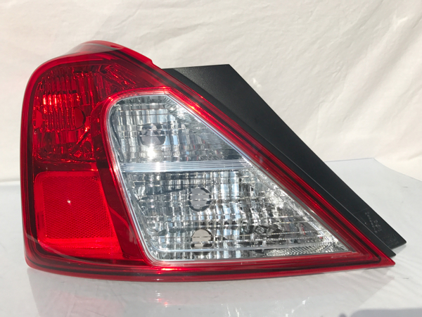 ティーダ ラティオ N17 純正 左 テールランプ ICHIKOH D140 美品