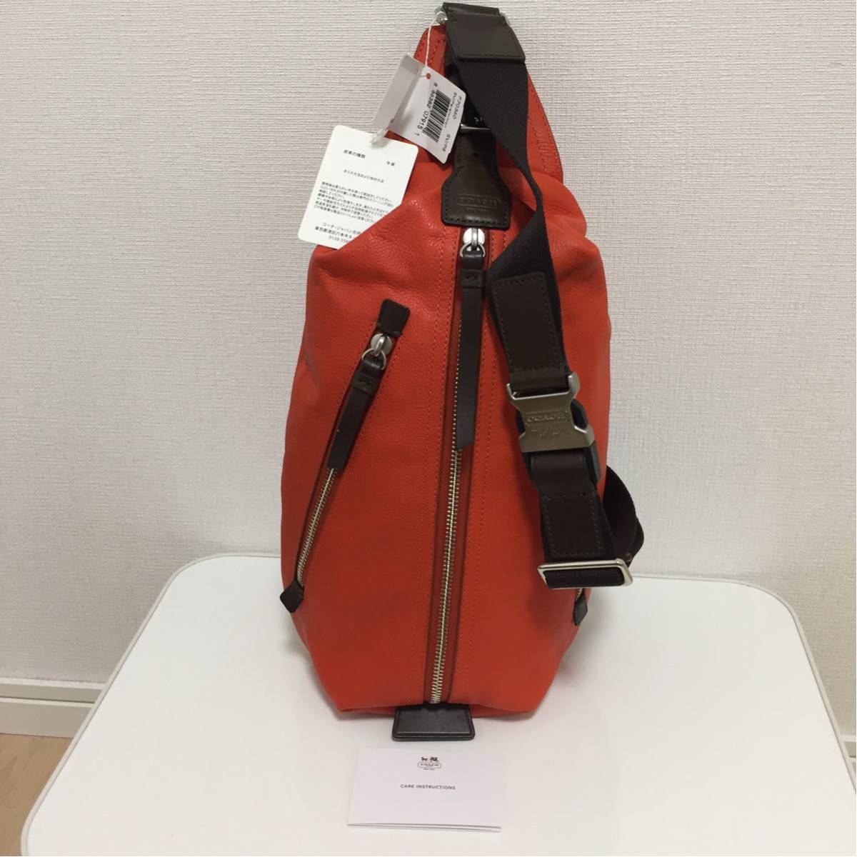 新品タグ付き】COACH コーチ トンプソン レザー スリング パック 