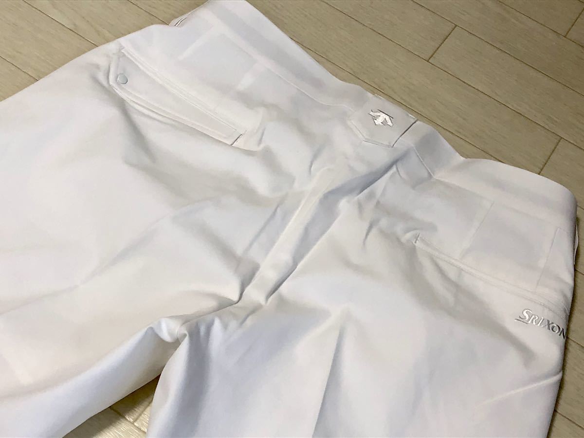 SRIXON by DESCENTE スリクソン メンズ 中古 スリクソンbyデサント 半袖シャツ L Srixon - 半袖ポロシャツ ダンロップ 女子オープンゴルフ フロントのグラフィックデザインが目を惹く、秋冬に重宝する撥水 SRIXON-「松山プロ共同開発」トラックジャケット