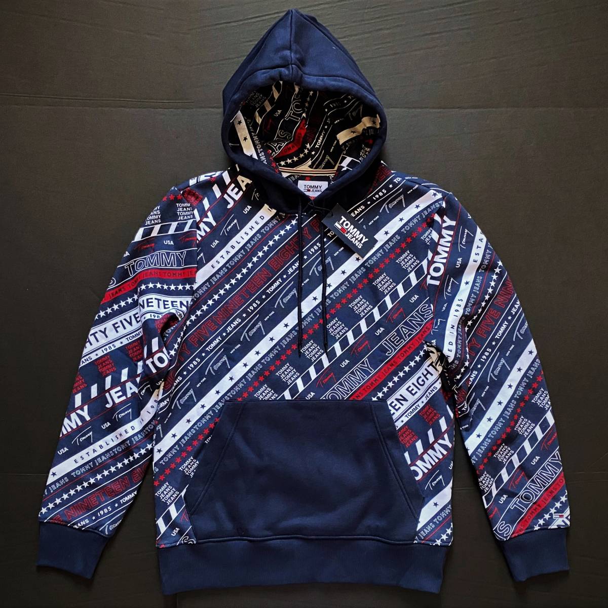 新品USAトミーヒルフィガー TOMMYJEANS総柄スウェットパーカ ネイビー 