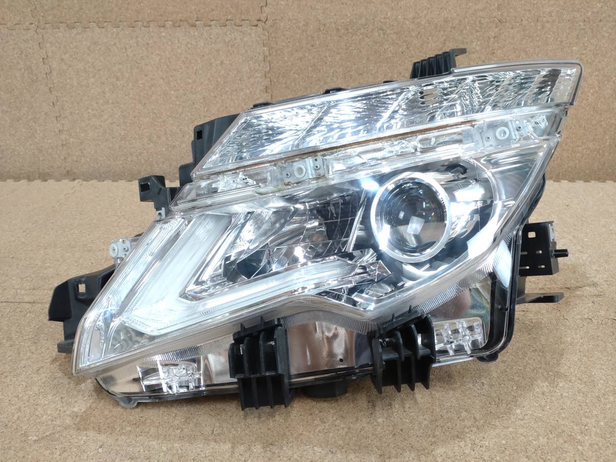 日産 エルグランド E52 左ヘッドライト KOITO コイト 100-23674 中期 