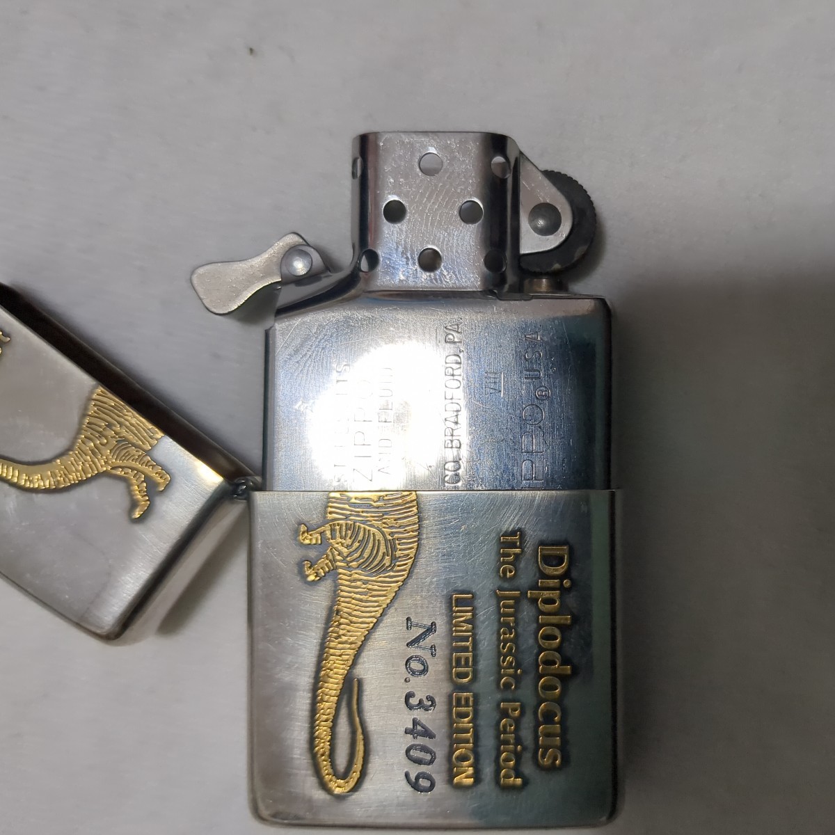 Zippo 2個セット 恐竜 ダブルイヤー フラットトップ(Zippo)｜売買され 