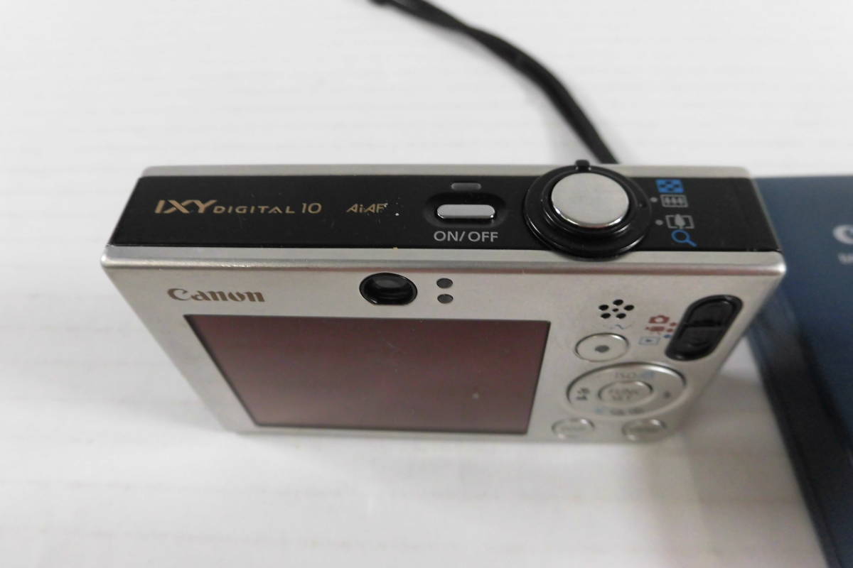 38/Ω549☆キヤノン Canon IXY DIGITAL 10 ☆ 中古品☆電池蓋破損あり