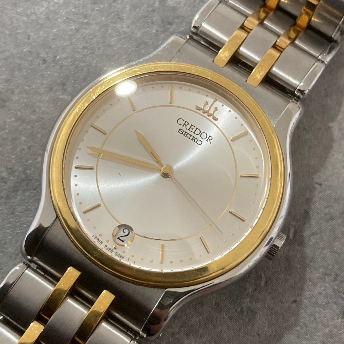  稼働品 SEIKO セイコー クレドール 18KTベゼル &times; SS デイト クォーツ 腕時計 8J86-6A00 メンズ 稼働品 ホワイト文字盤(クレドール)｜売買されたオークション情報、yahooの商品情報をアーカイブ クレドール