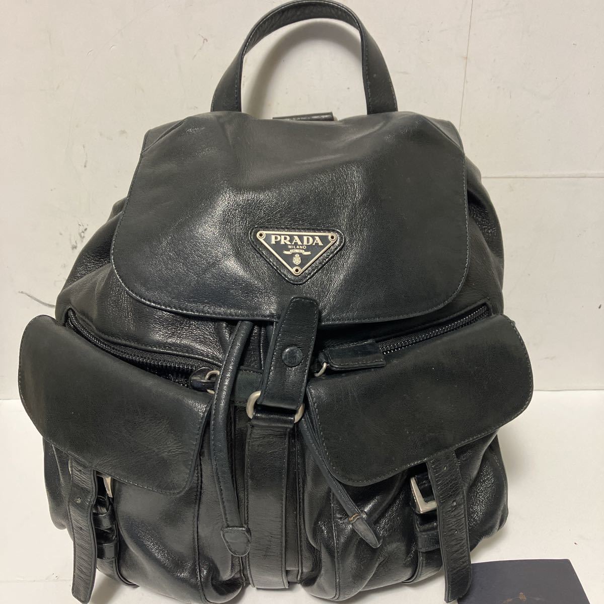 PRADA プラダ リュックサック レザー ロゴプレートバックパック プラダ