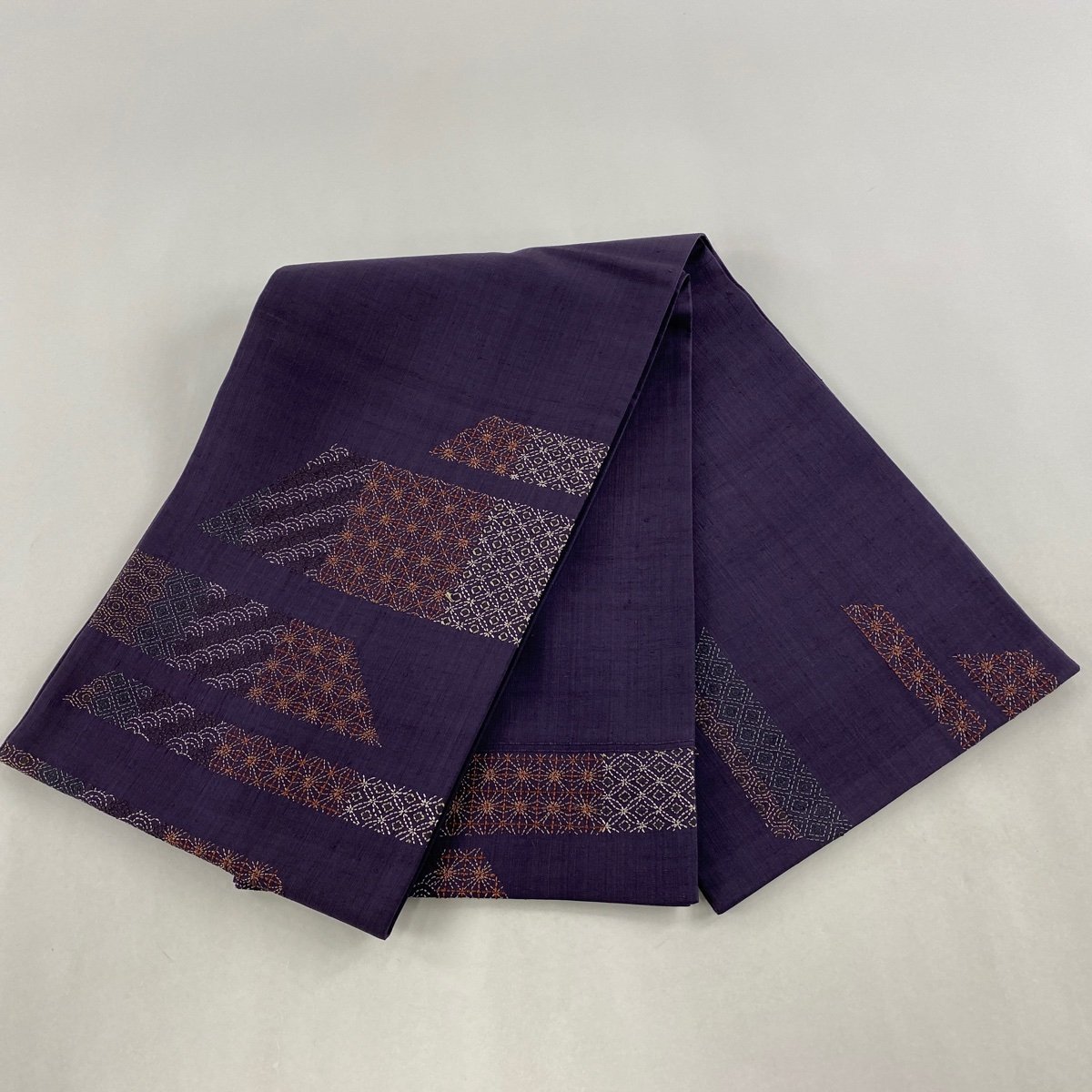袋帯 秀品 やまと 紬地 青海波 七宝 刺子刺繍 濃紫 お太鼓柄 正絹 