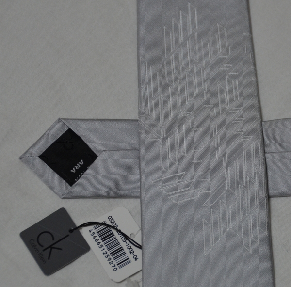 ▼▼CKカルバンクラインネクタイ(灰，台形柄，ナロー)新品