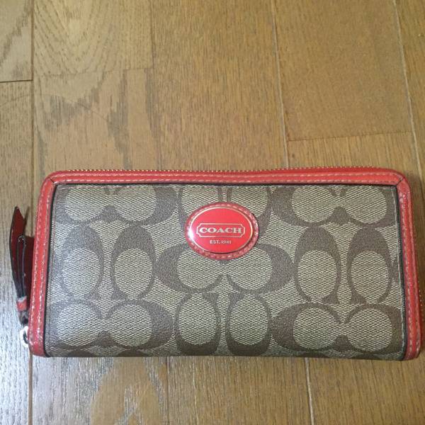 美品 コーチ シグネチャー ラウンドジップ 長財布 オレンジ