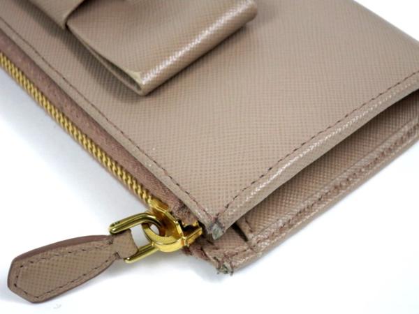 48636☆1円本物プラダL字ファスナー長財布サフィアーノ☆リボン プラダ
