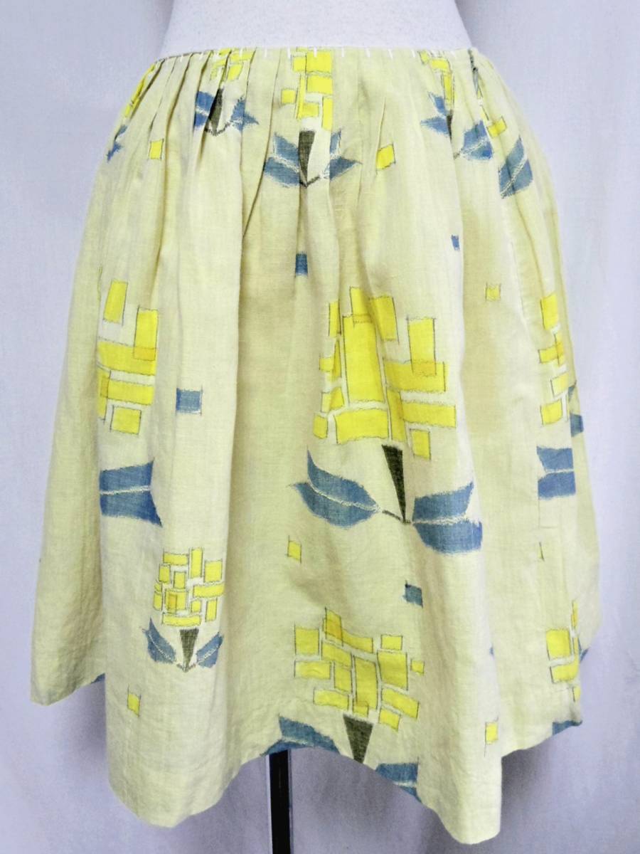 （株）ミナ　日本製　黄色ベース　　黄色い花柄　ひざ丈スカート綿麻MIX　　中古　ミナペルホネン　