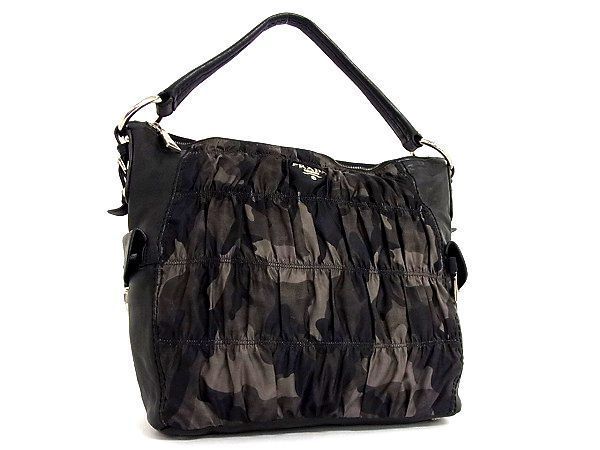 PRADA プラダ レザー - レディース ナイロン テスートナイロン トライアングルロゴ ワン 0 ミニ ロゴプレート 極美品 1円 ショルダーバッグ 時代を超えて愛される、プラダの「Re