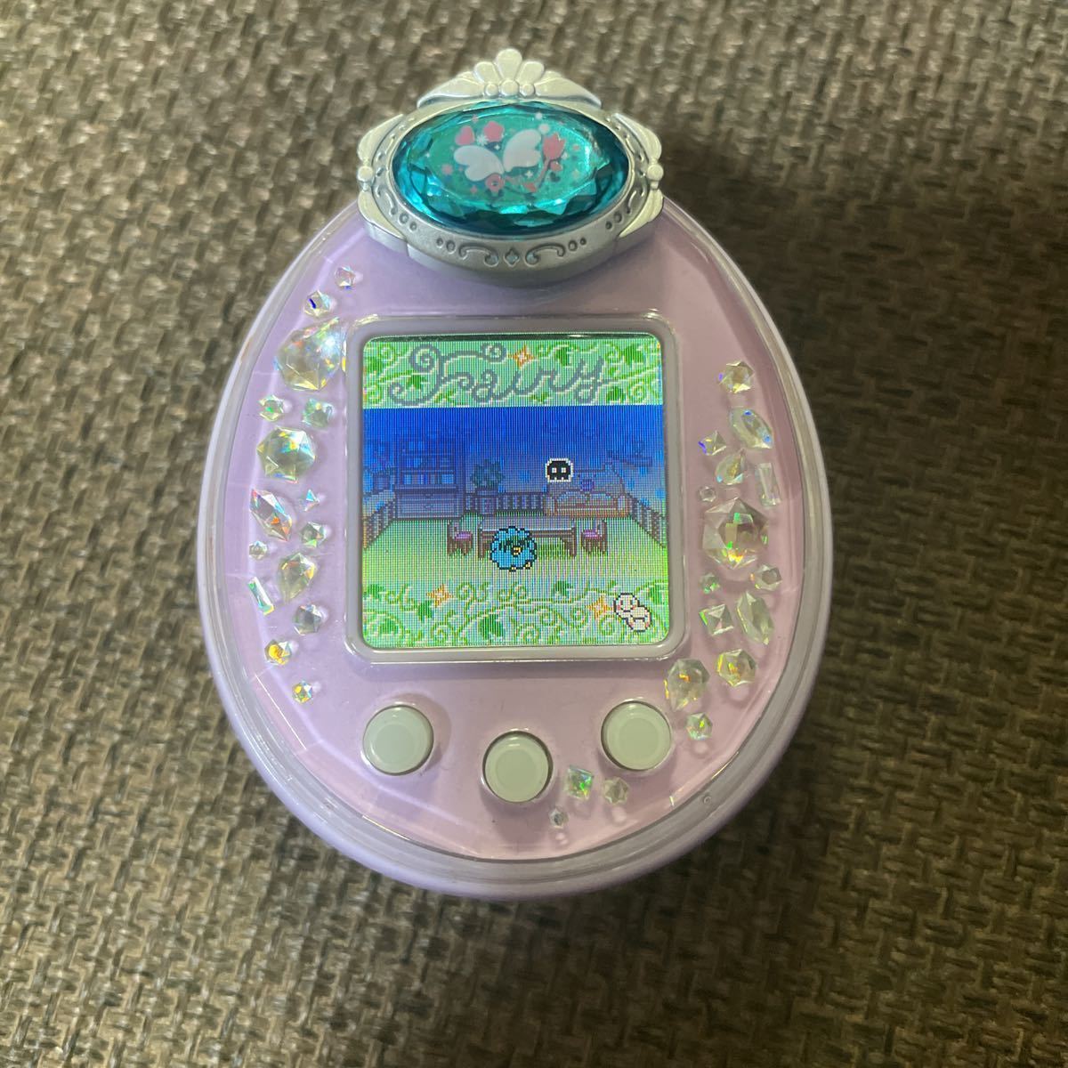 たまごっち たまごっちぴーす パープル フェアリーピアスつき Tamagotchi たまごっち 売買されたオークション情報 Yahooの商品情報をアーカイブ公開 オークファン Aucfan Com