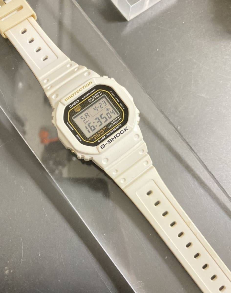 良品 G-SHOCK DW-5025D-8JF 25周年記念限定 オーシャングレー ゴールド