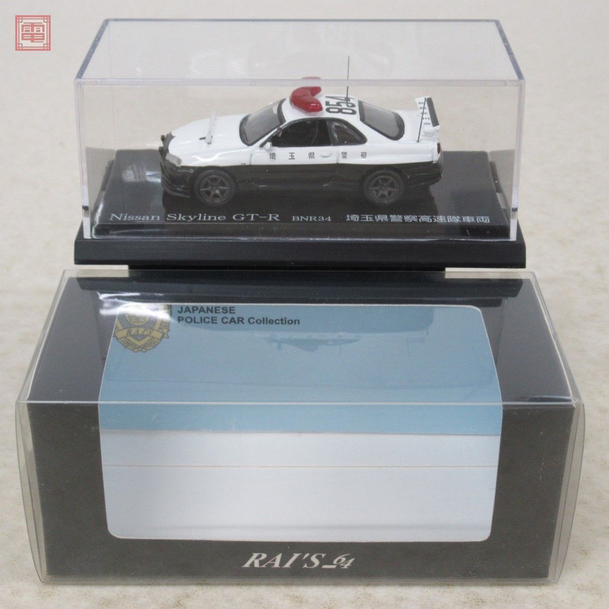 1/64 ミニカー 警察パトカーレイズR34 レイズ1/64日産スカイラインGT-R