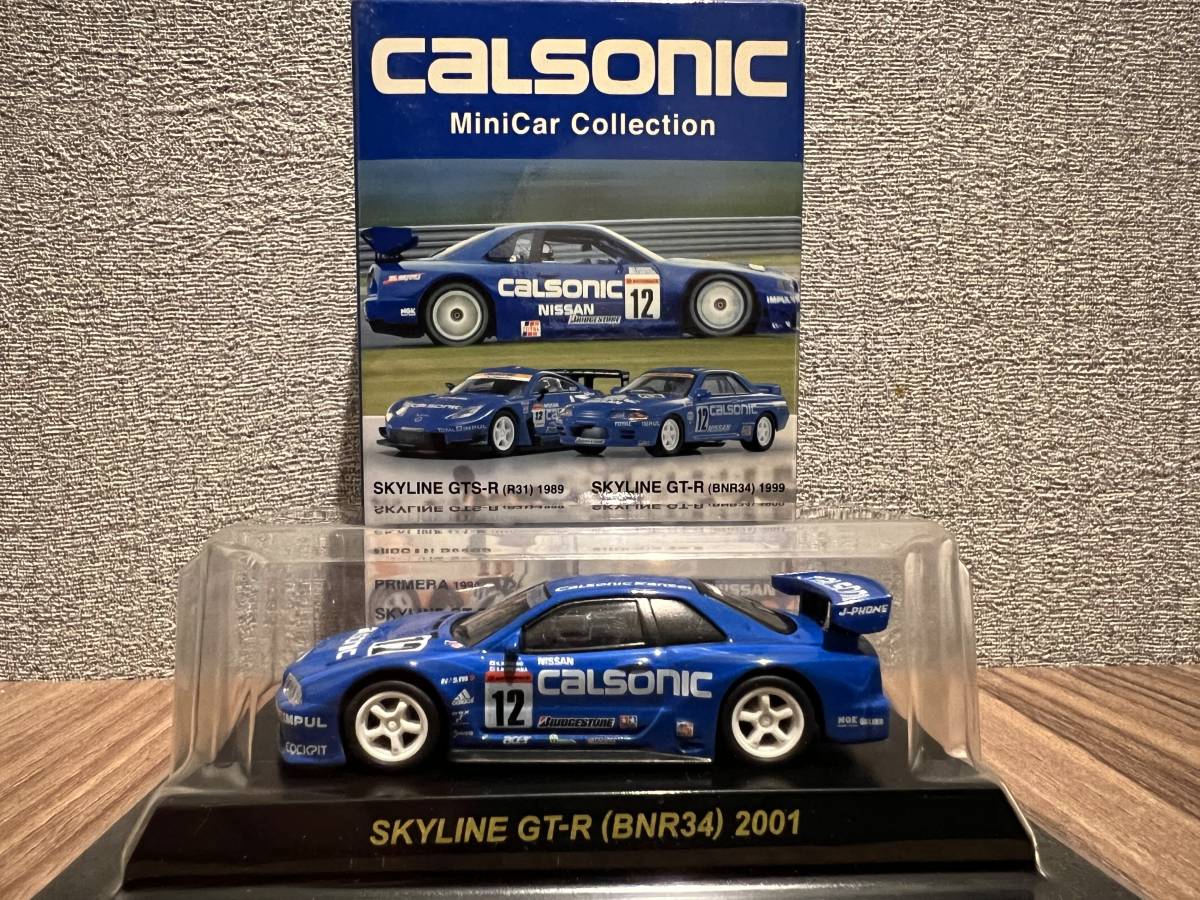 Voiture Miniature 1/64 Kyosho - Nissan Skyline GTS-R R31 Calsonic 1989, Modèle Die-cast Occasion