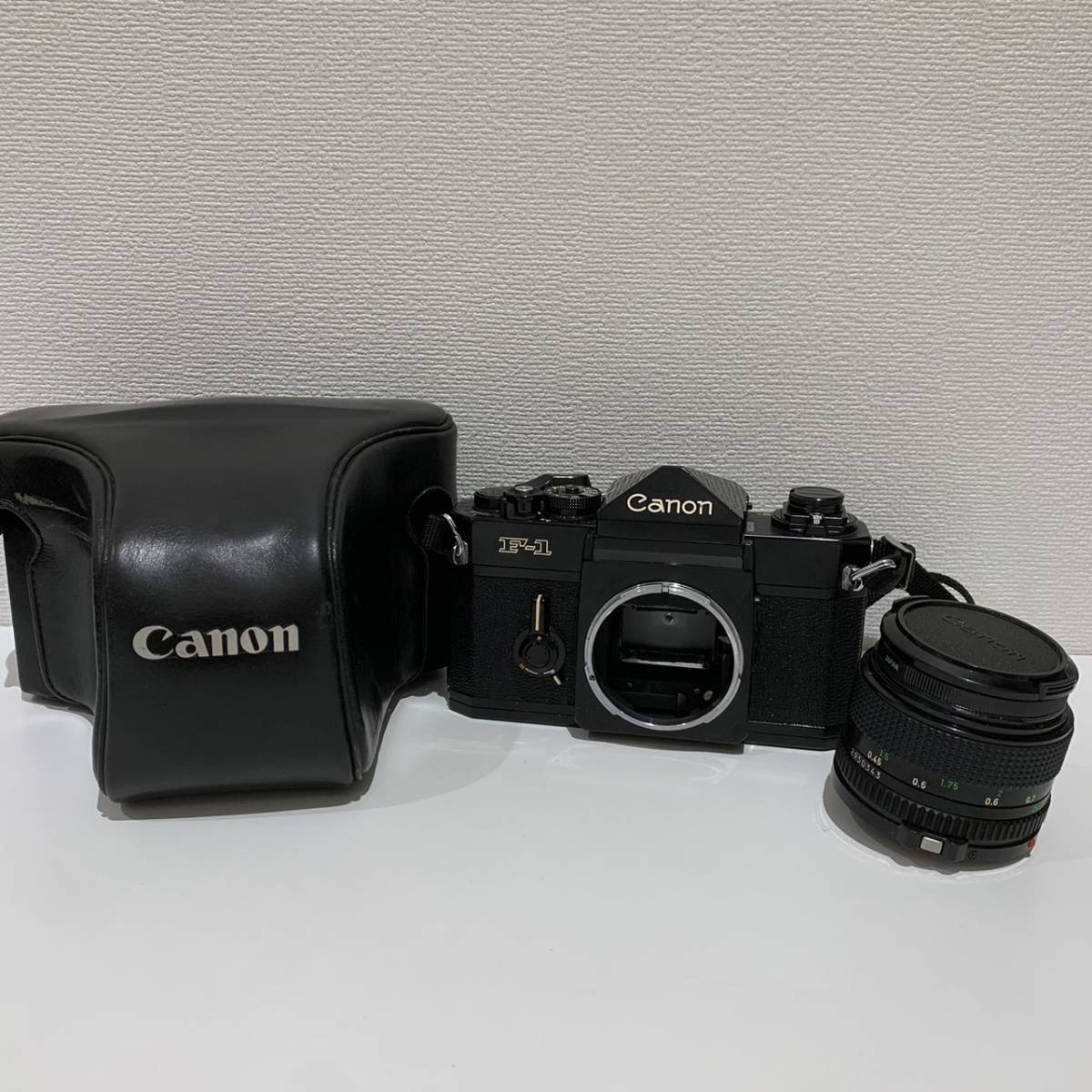 【AMT-3698】1円～ Canon キャノン 旧F-1 後期モデル ブラック フィルム一眼レフカメラ/レンズ FD 50mm 1:1.4/ケース 動作未確認 レトロ