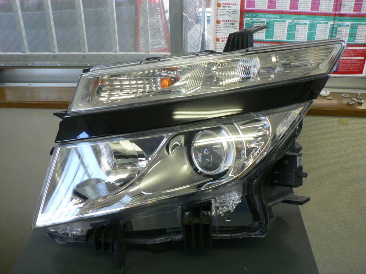 エルグランド E52 前期 純正 HID 左ヘッドライト KOITO 100-23009
