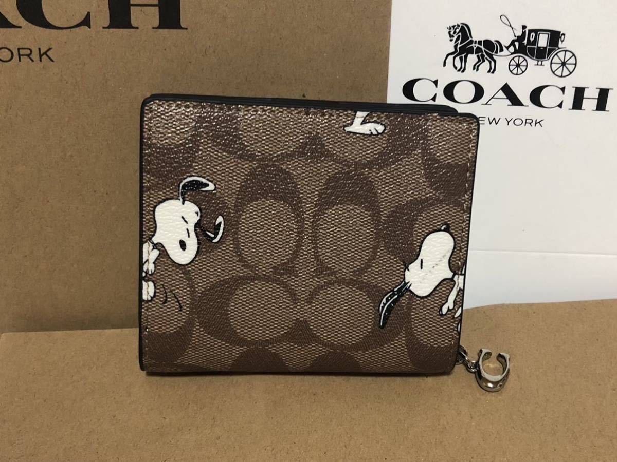 コーチ二つ折り財布 PEANUTSコラボ スヌーピー財布(二つ折り財布（小銭