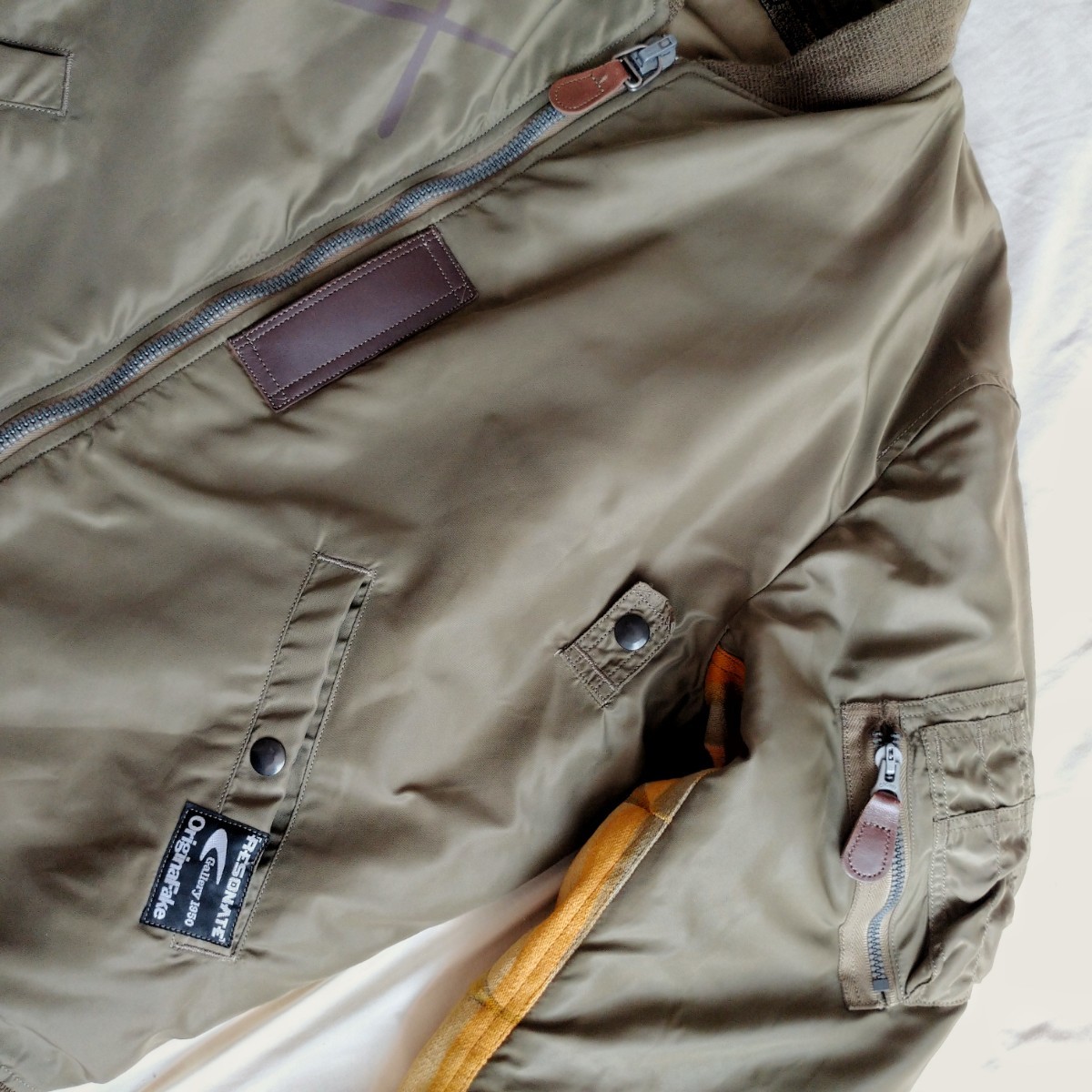 ☆別注 ORIGINALFAKE KAWS × G1950 × GOODENOUGH × バズリクソンズ MA1 