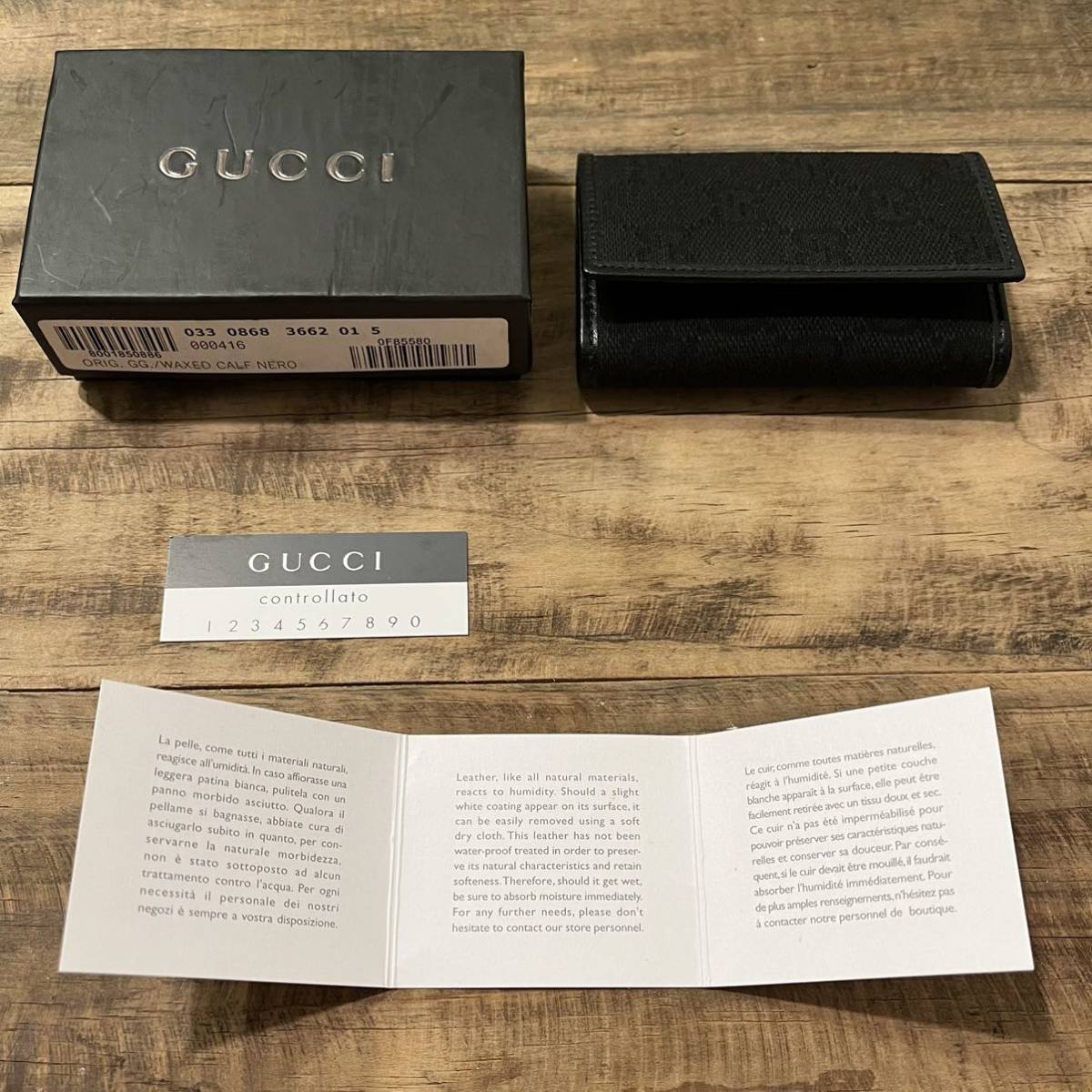 新品！未使用！箱付き！GUCCI グッチ イタリア製 6連 キーケース GC柄 小物 キャンバス レザー 黒 ブラック 正規品 鑑定済み グッチ GUCCI 未使用 ジップアラウンドウォレット 長財布 ハウンド