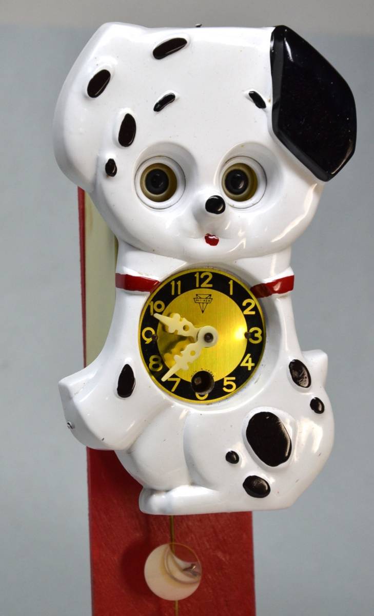 ミケン時計 が1965年頃 販売した、犬の目玉が動く振り子式掛時計