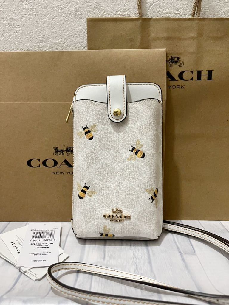 コーチ スマホショルダーシグネチャー ハニービー 蜂 ハチ