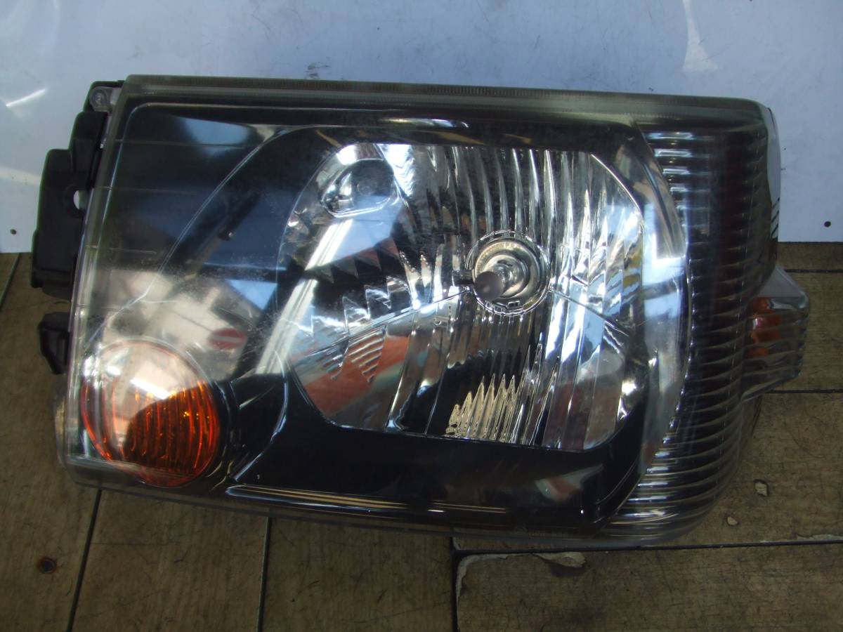 三菱　ミニキャブ　トラック　Ｕ６１Ｔ　ヘッドライト　左