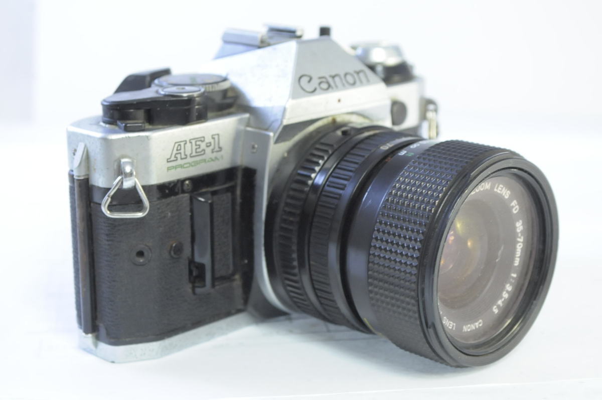 Canon AE-1 フィルム一眼レフカメラ　ジャンク品 Canon AE-1 ジャンク PROGRAM 公式通販 FD 35-70mm 50mm with Camera