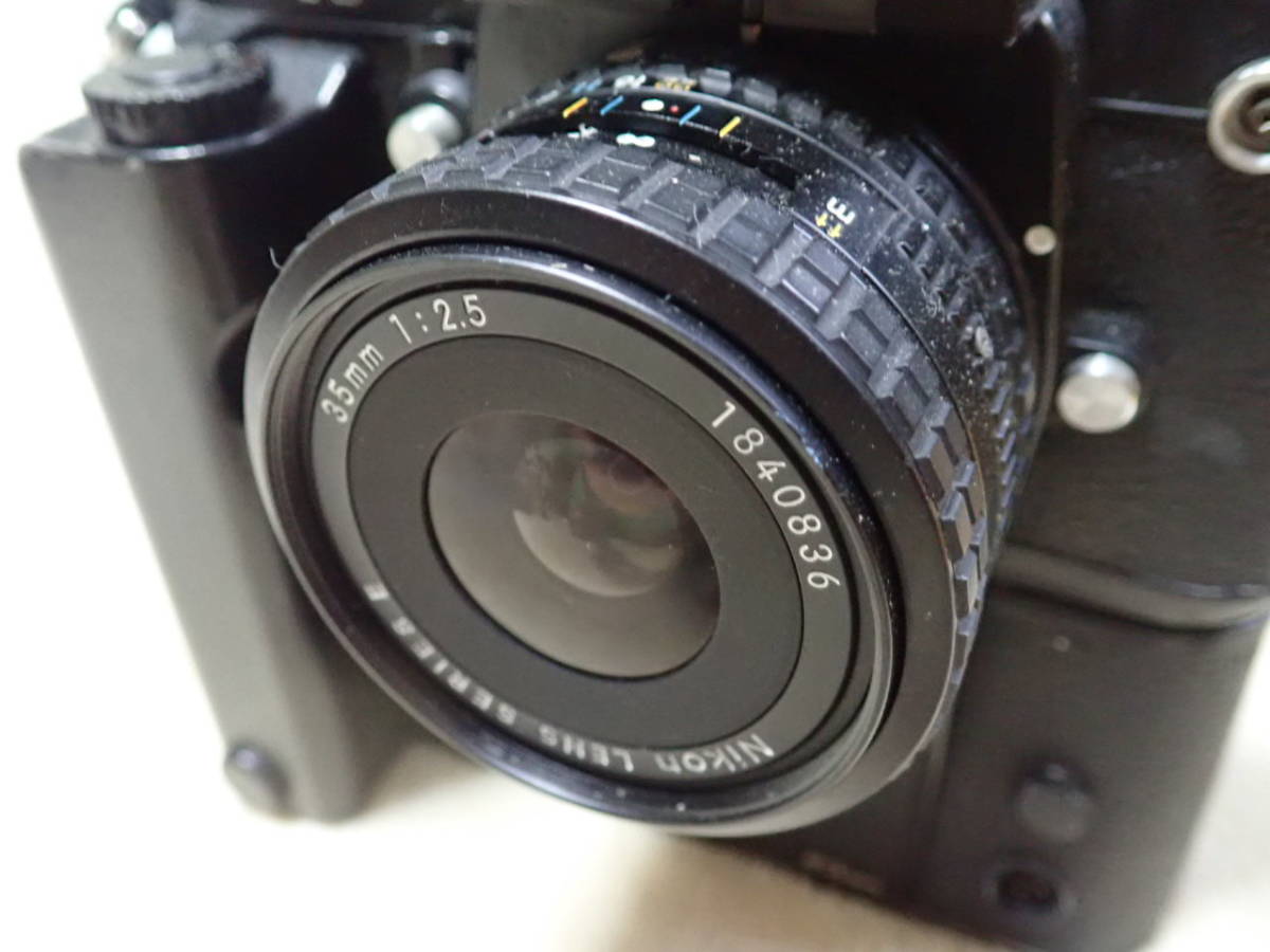 35mm Nikon E f⁄2.5 Series | F2.5 SERIES LENS – Repair: Richard