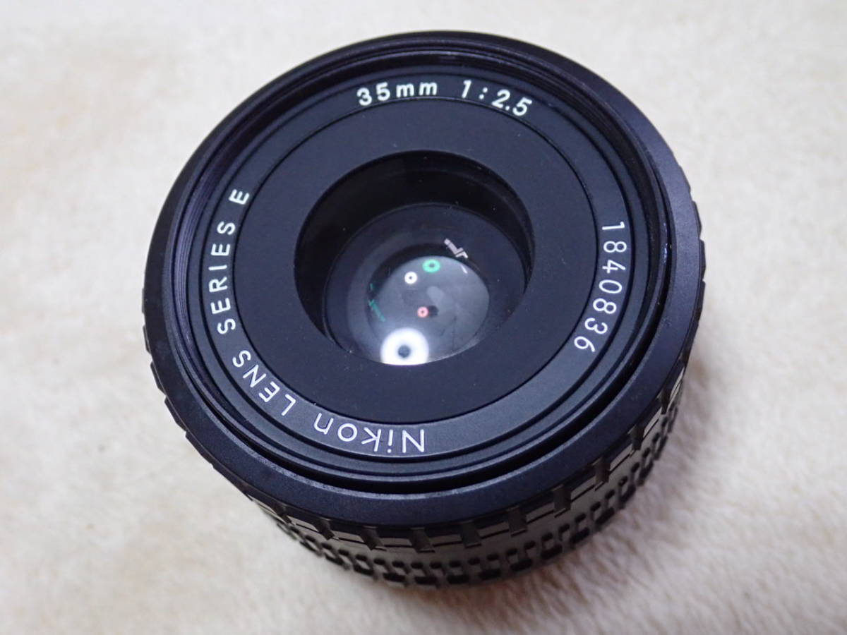 35mm Nikon E f⁄2.5 Series | F2.5 SERIES LENS – Repair: Richard