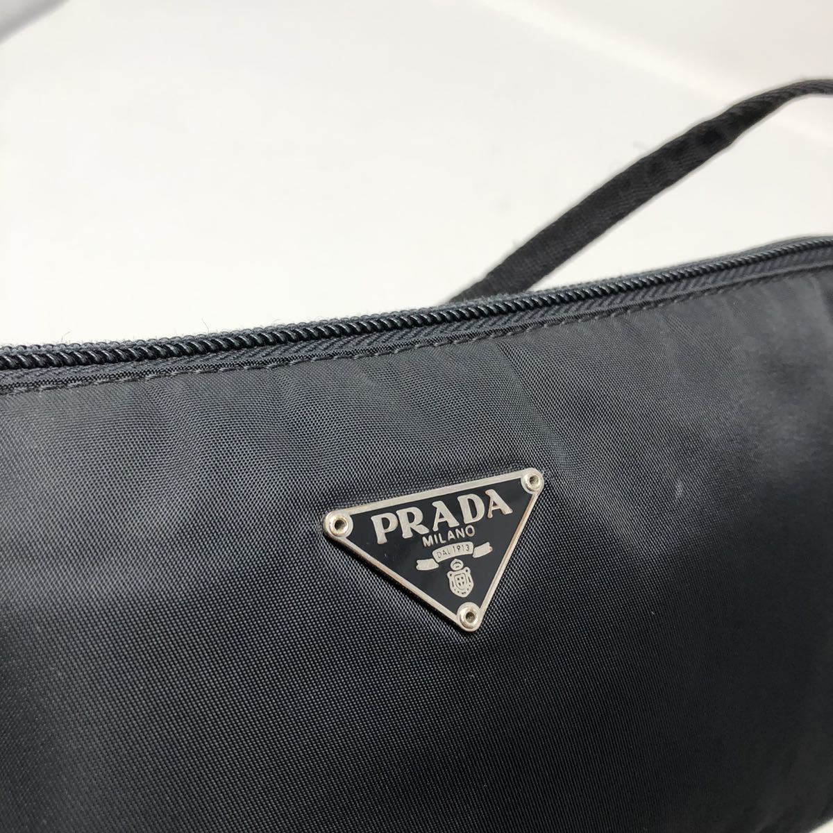 プラダ PRADA 化粧品ポーチ 三角ロゴ 黒 ナイロン 鞄 ミニハンドバッグ 