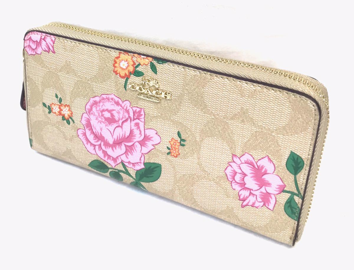 COACH コーチ 長財布シグネチャー ローズ フローラル バラ ラウンドジップ コーチCOACHシグネチャーに鮮やかなピンクのバラの花長財布ジップ