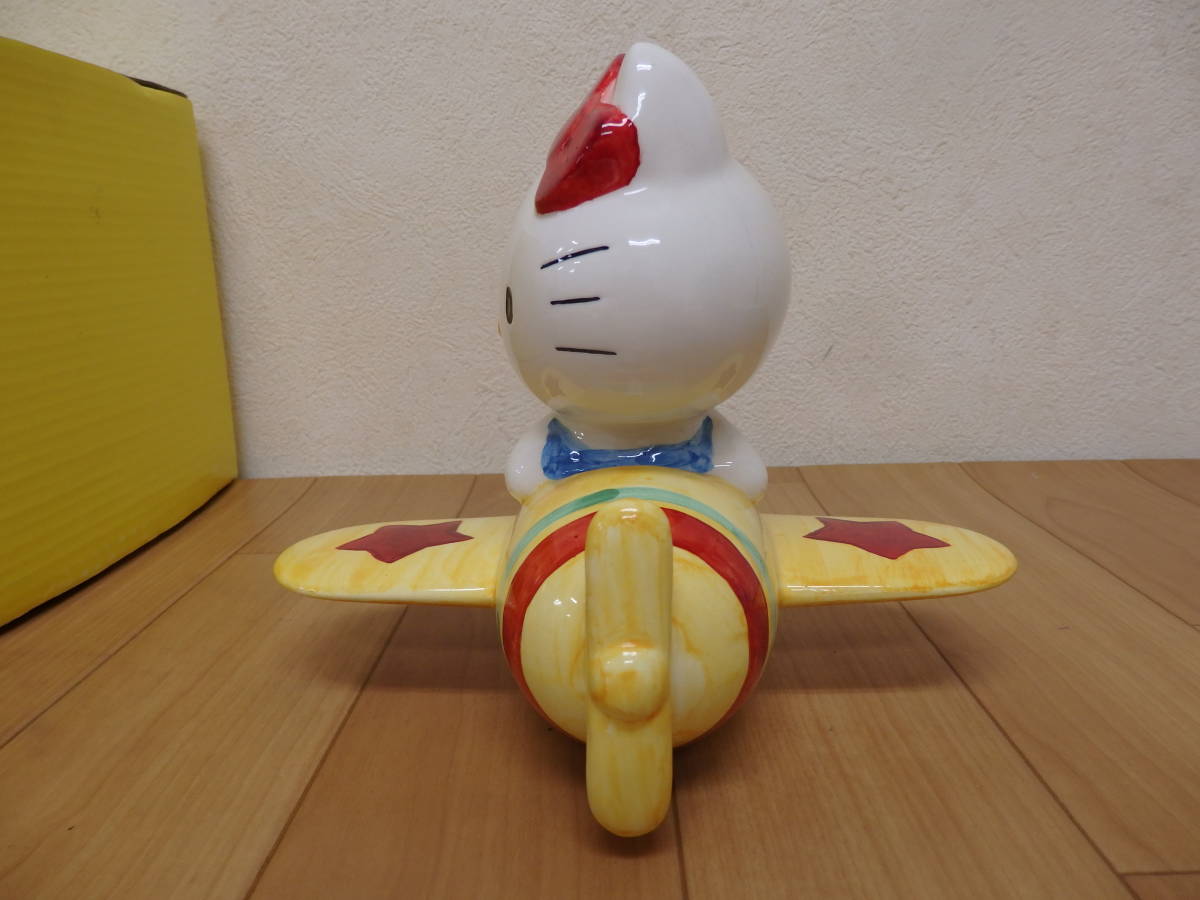 F5-4.4) サンリオ ハローキティ 陶製貯金箱 飛行機型 黄色 陶器製