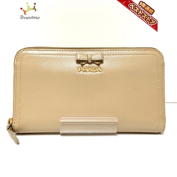 プラダ PRADA 長財布 - レザー ベージュ リボン/ラウンドファスナー 財布