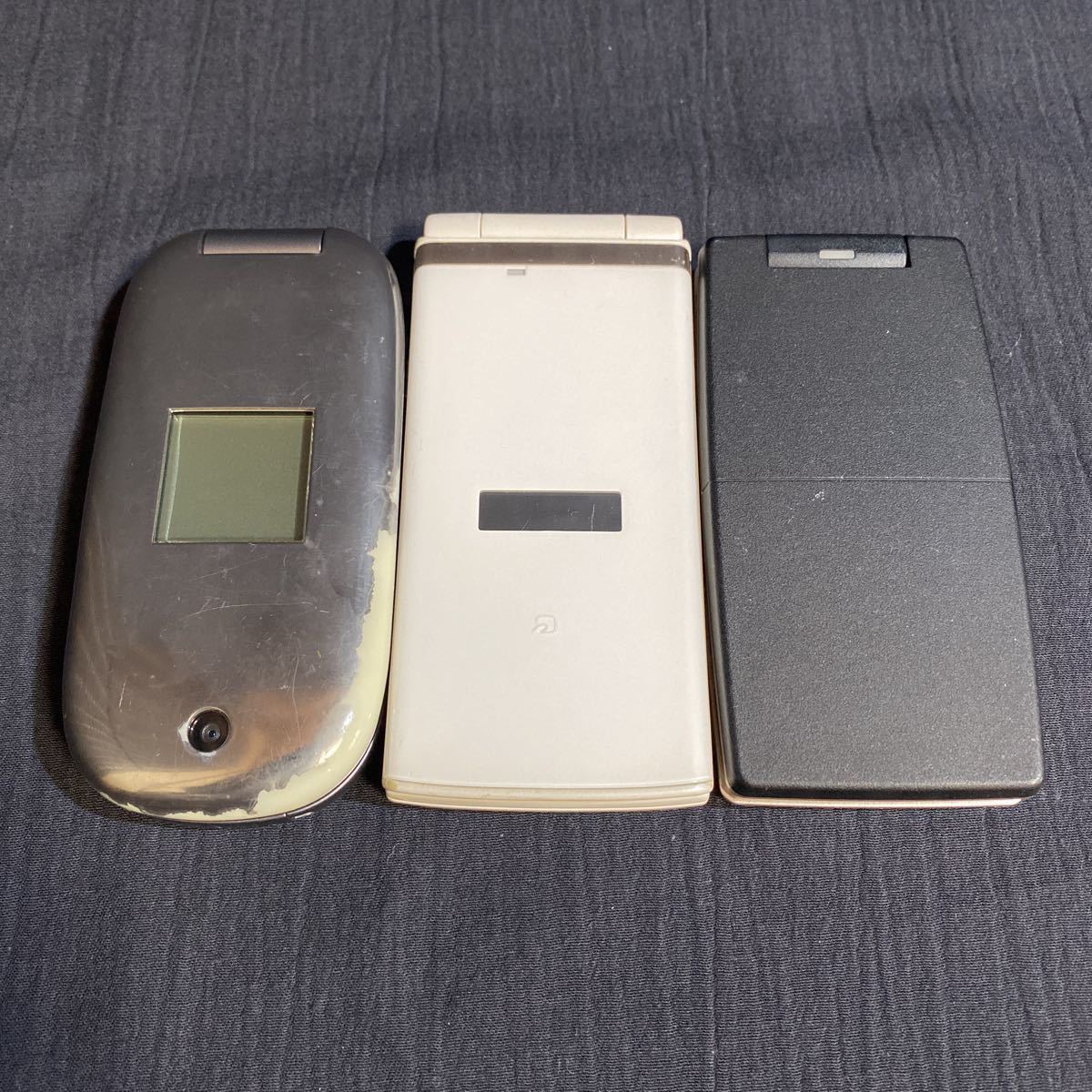 K006 携帯電話 まとめ売り 3台 ドコモ/docomo F-97A 富士通 au K006 NS02 動作未確認 ジャンク(携帯電話)|売買された ...