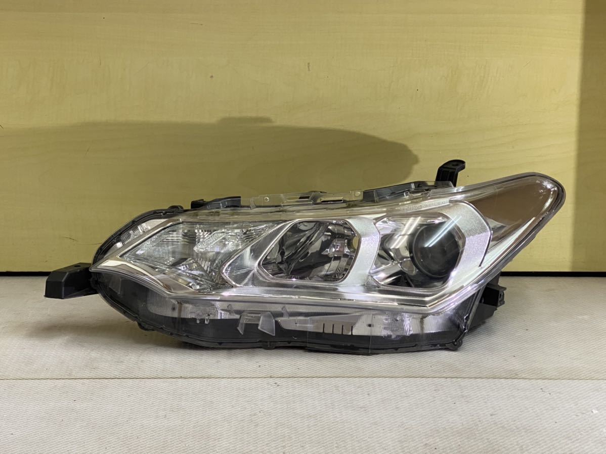 NZE161 カローラアクシオ 左ヘッドライト Koito 12-595 HID#3555