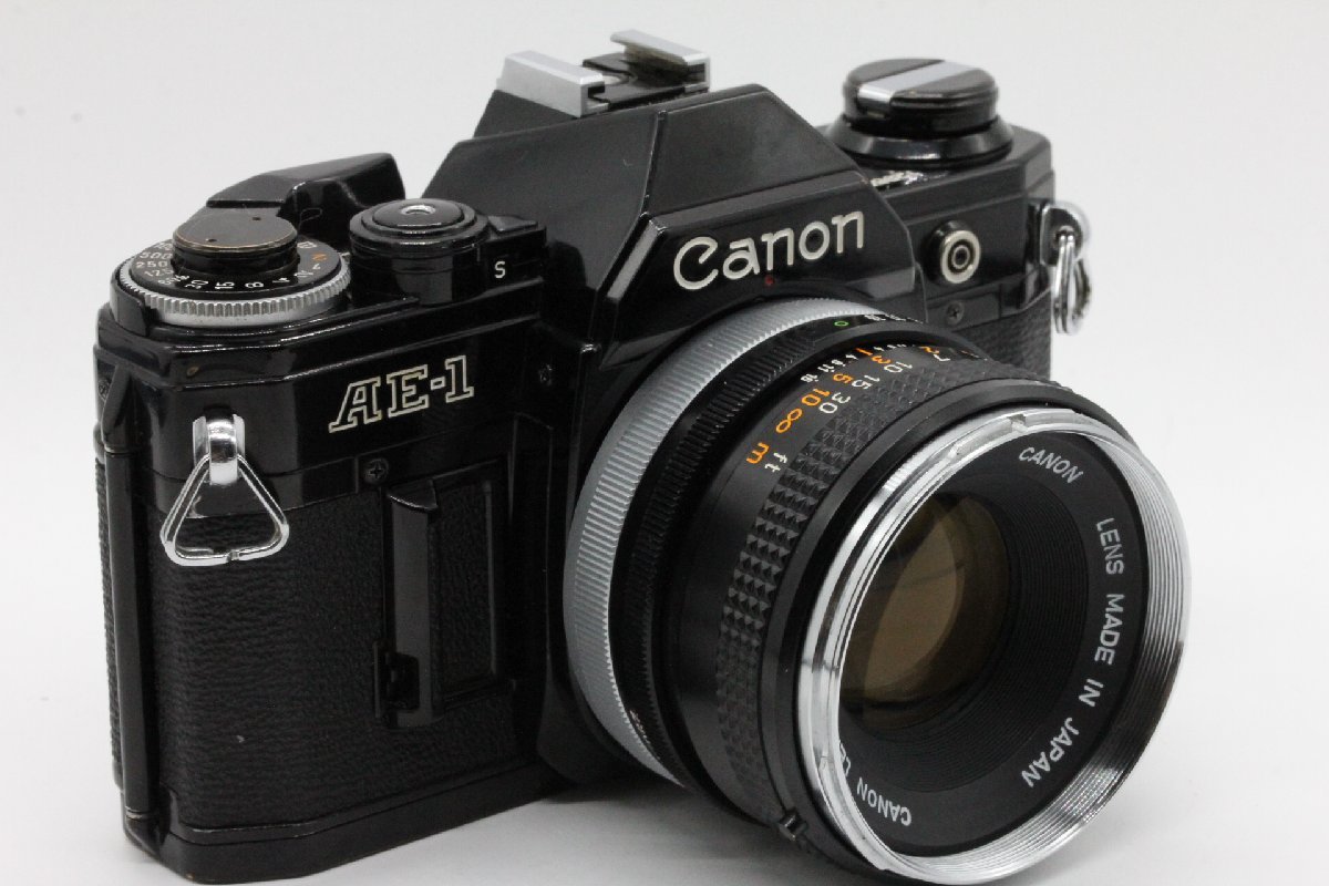 【美品】Canon キャノン AE-1 + FD 50mm F1.8 #54 Canon キャノン AE-1 ブラック / 旧FD 50mm F1.8 初期型の銀枠「O
