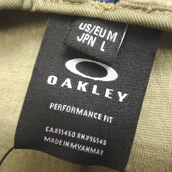 □OAKLEY オークリー スカル ゴルフ 新品 定1.9万 撥水 防風 保温 2WAY