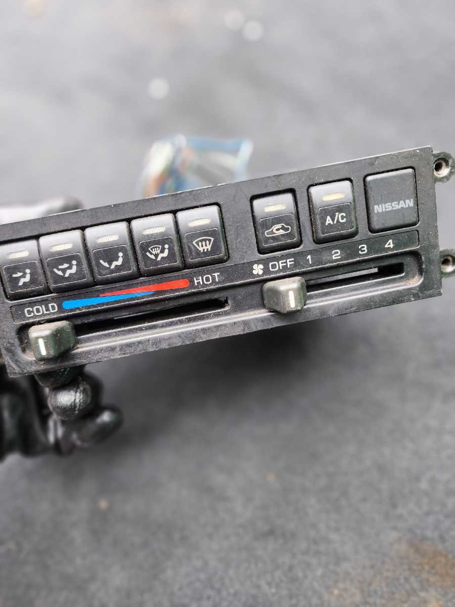 キャラバン E24 エアコンスイッチ エアコンパネル 送料無料(日産用