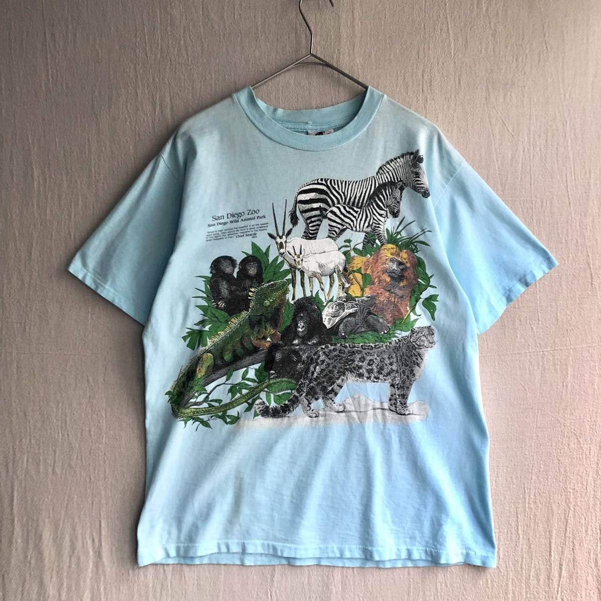 USA製 90s Harlequin Tシャツ / ユニセックス L コットン ブルー プリント 動物 動物園 ビンテージ T3-02044-9376 sale