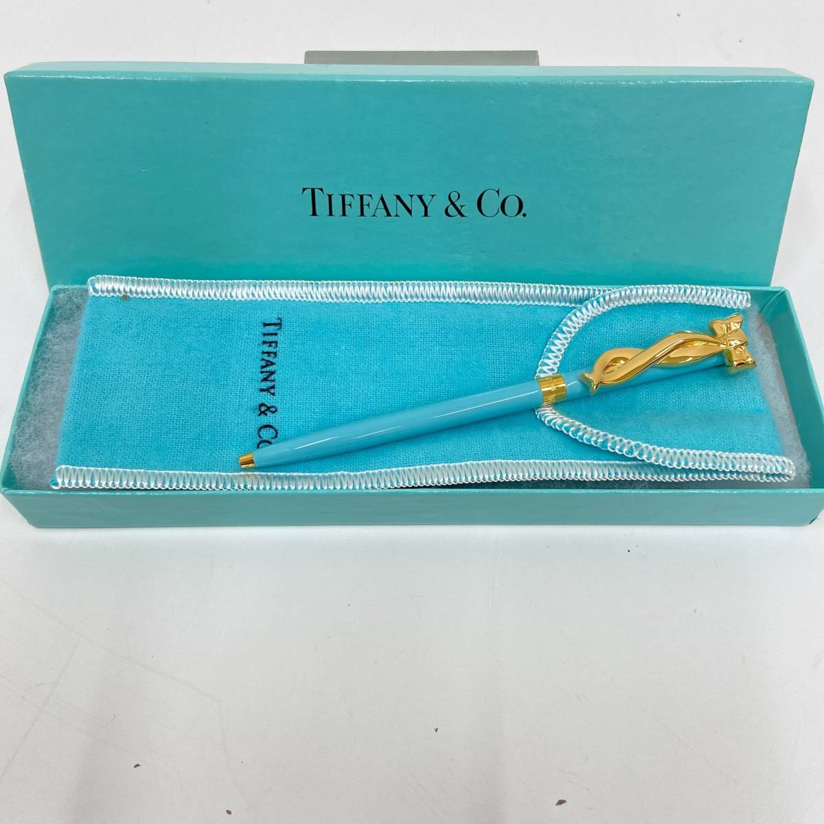 TIFFANY&Co. ティファニー リボン ティファニーブルー 回転式 ボールペン ブランド筆記用具 ゴールド 箱・保存袋付き インク無し【3505】