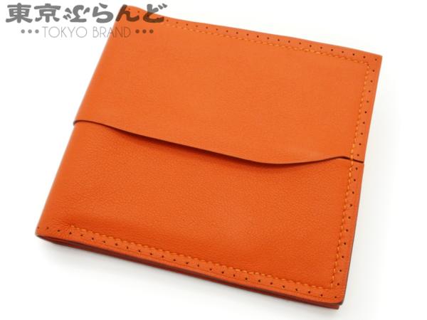 101130427 エルメス フレックス 二つ折り財布 オレンジ展示品 VK