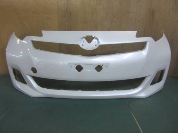 NCP120 ラクティス フロントバンパー パール 90255