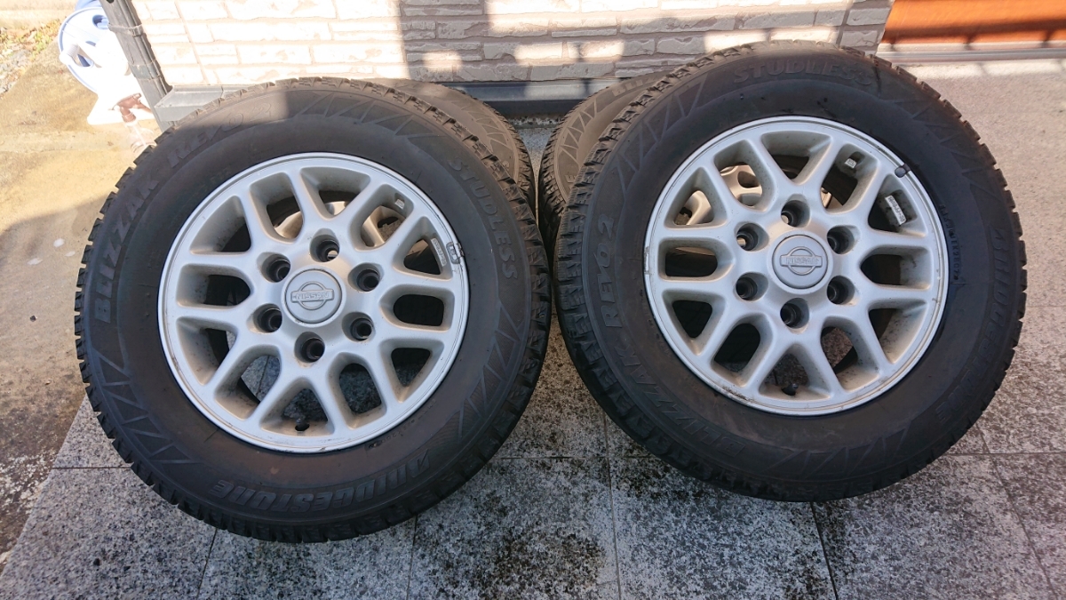 ★NISSAN E50エルグランド BRIDGESTONEブリザック REVO2 215/65R15 純正ホイール 4本セット中古品★
