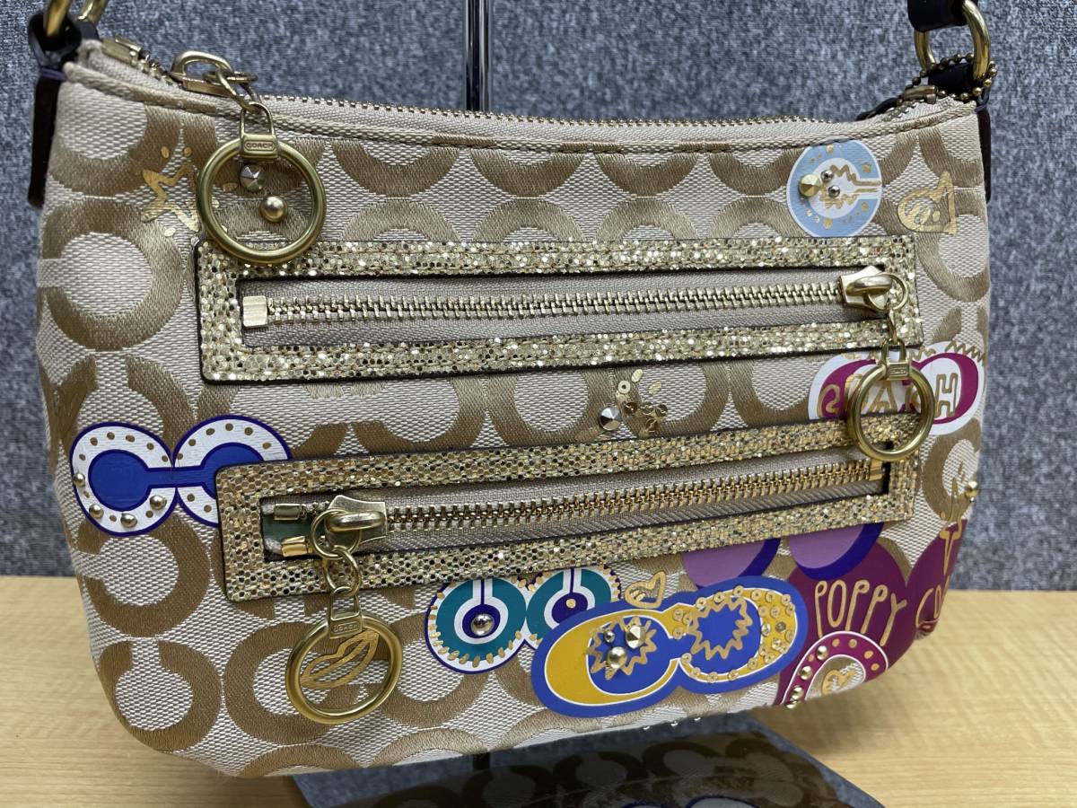 美品コーチポピーCOACH POPPYシグネチャーアクセサリーポーチ☆B2081 