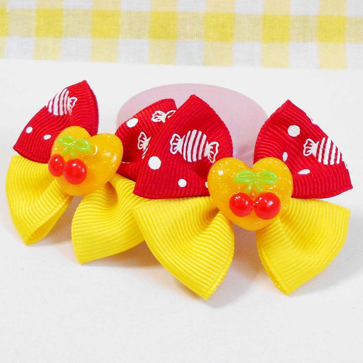 150 E1x5berry ハンドメイドヘアゴム 赤キャンディ柄ｘ黄色リボン さくらんぼ ペア リボン 売買されたオークション情報 Yahooの商品情報をアーカイブ公開 オークファン Aucfan Com