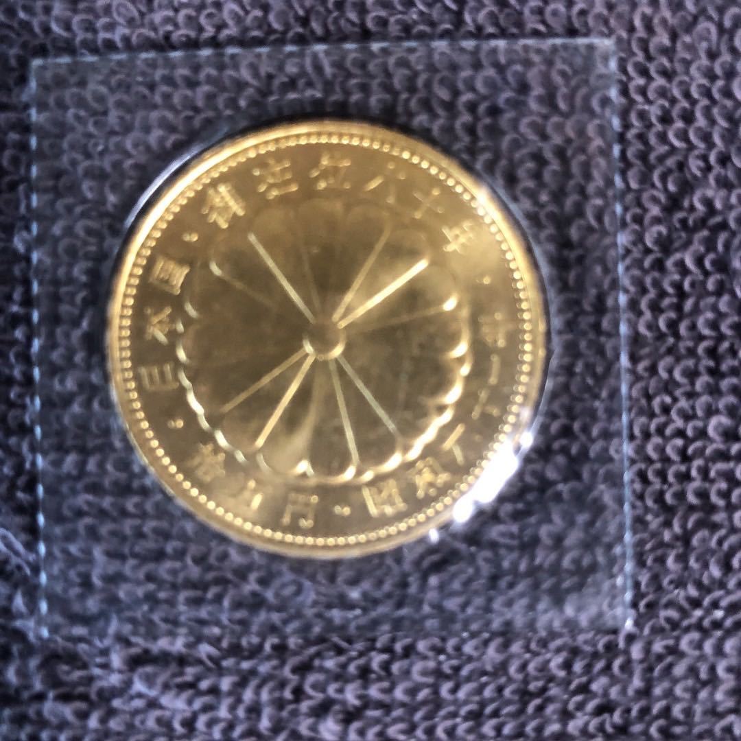 昭和61年 10万円金貨 K24 純金 天皇陛下御在位60年